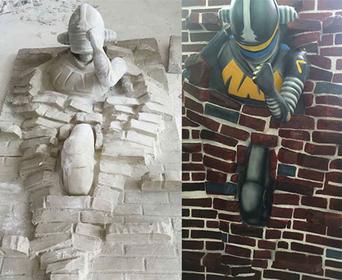 玻璃钢穿墙机器人浮雕雕塑 玻璃钢穿墙机器人浮雕雕塑