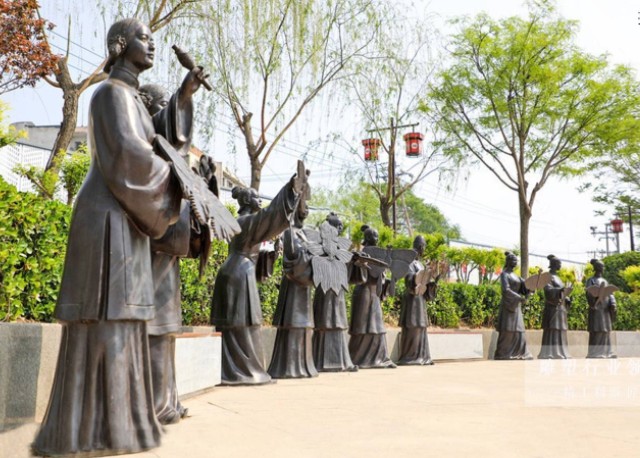 复古仿铜玻璃钢放风筝人物雕塑