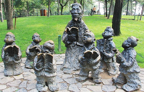 学校玻璃钢读书雕塑